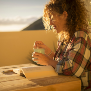 An image of a woman drinking ginger tea