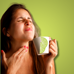 An image of a woman drinking lime juice for sore throat
