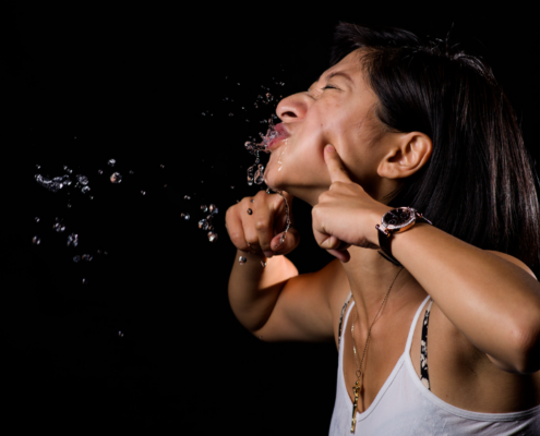 woman doing a throat gargle