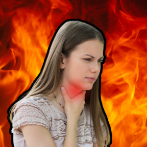 An image of a woman holding her inflamed throat with fire in the background